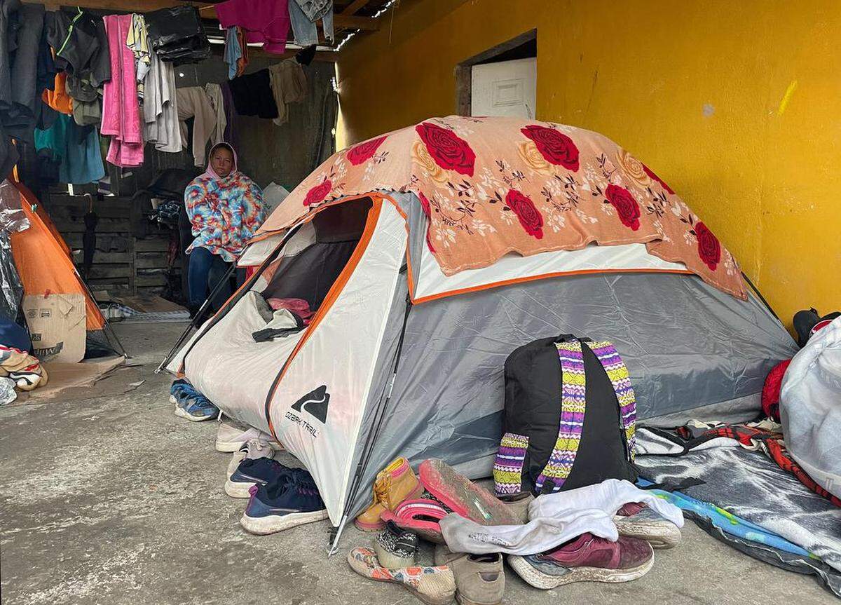 A group of Central American migrants are welcomed by a family in Matamoros, Tamaulipas.