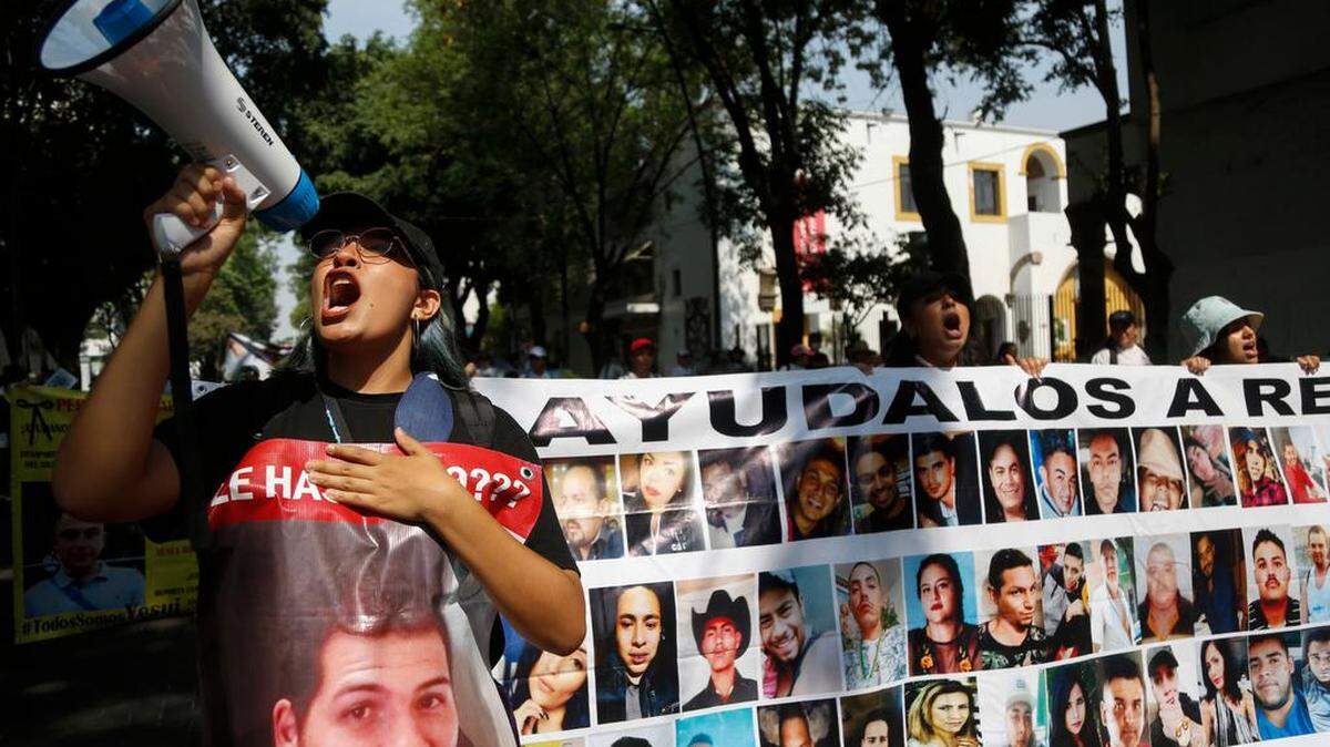 Relatives of missing people protest in Guadalajara, Jalisco in May. The country will end the year with more than 109,000 missing people.