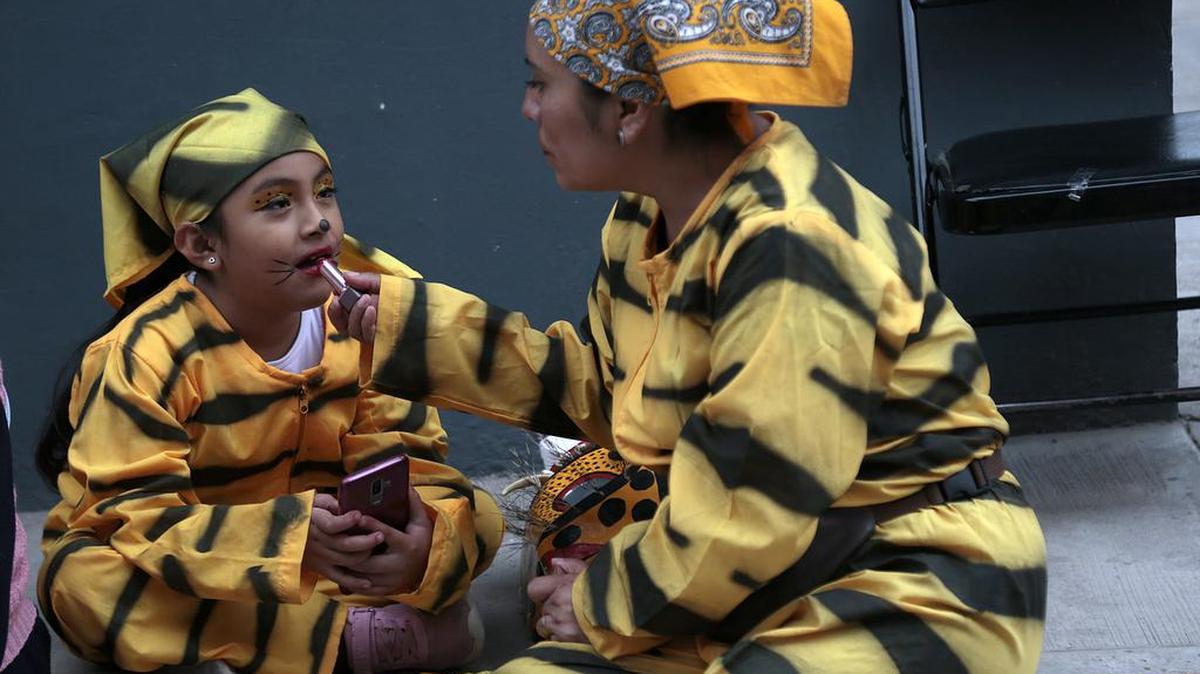 People take part in the Tigrada in Chilapa, Guerrero as part of a tradition that dates back more than three decades.