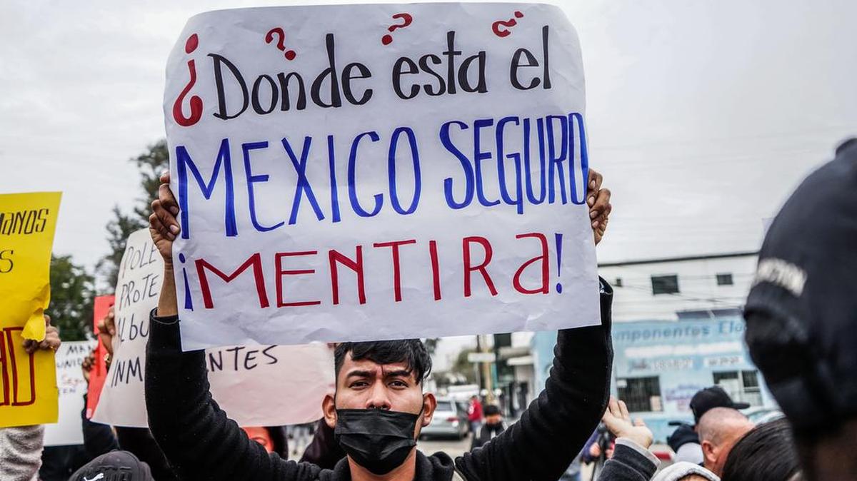 Migrants of various nationalities demonstrate due to the lack of security during their passage through México in a military barracks on Dec. 21 in Tijuana, Baja California.