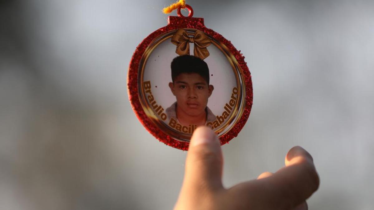 Families of those who have disappeared without a trace have put up Christmas decorations with the images of their loved ones.