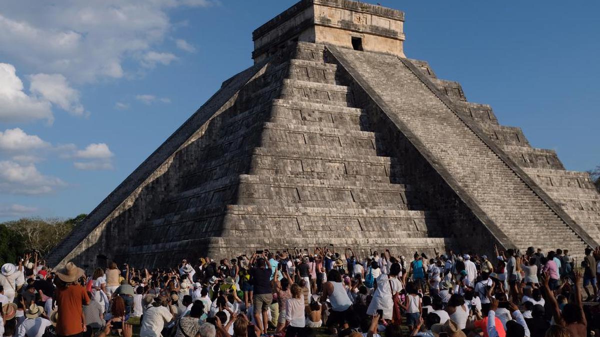 Tourists flocked to the ruins of Chichén Itzá to contemplate the descent of Kukulcán, the god of the Mayan culture in Mérida, Yucatán.