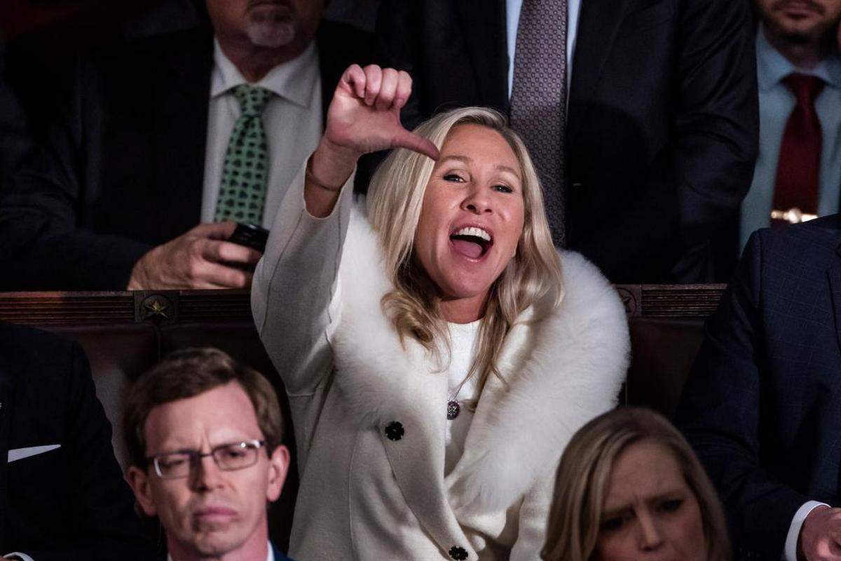 Republican Representative from Georgia Marjorie Taylor Greene reacts as President Joe Biden delivers his State of the Union address before a joint session of Congress in the United States House of Representatives chamber of the U.S. Capitol on Feb. 7.