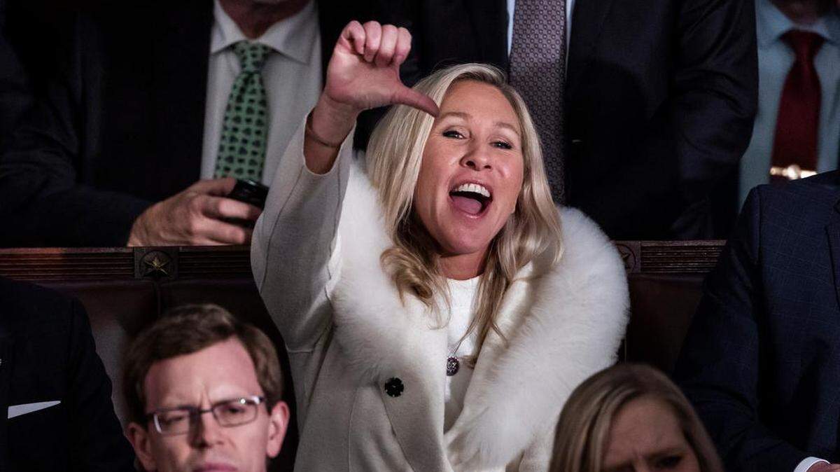 Marjorie Taylor Greene reacts as President Joe Biden delivers his State of the Union address on Feb. 7, 2023.