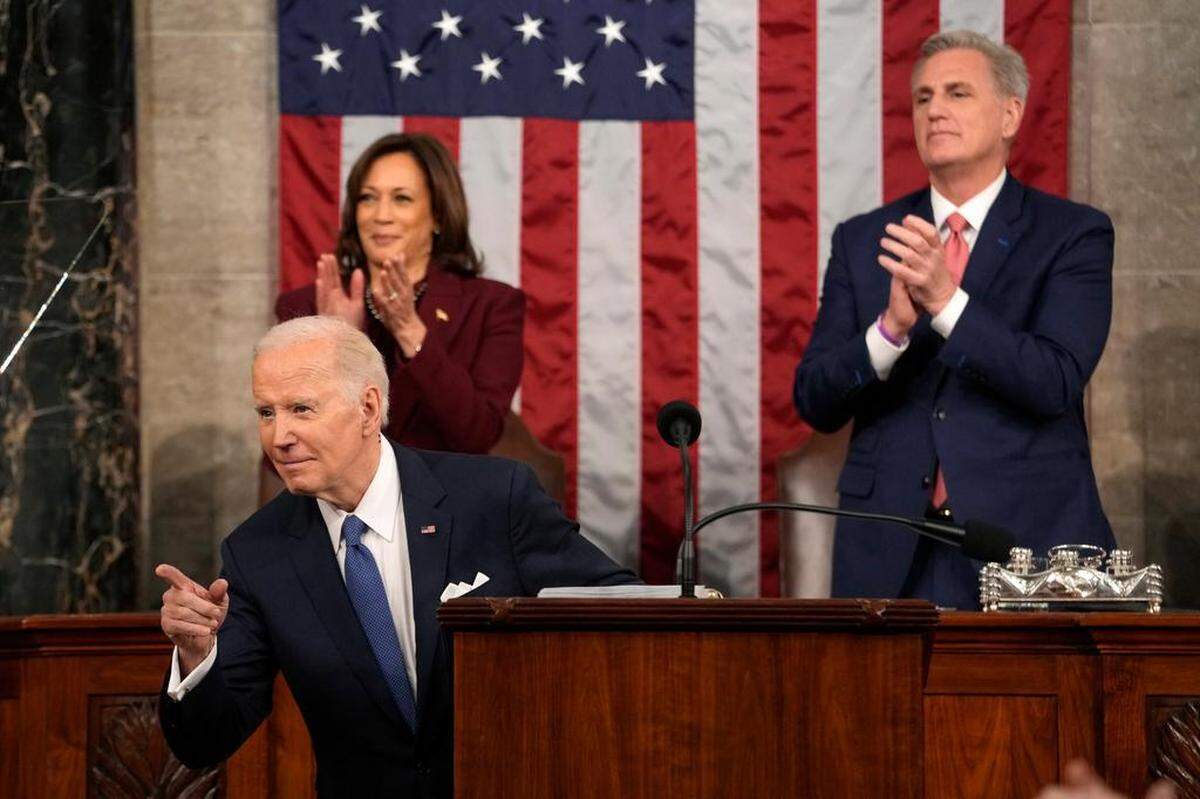 President Joe Biden gestures as he delivers the State of the Union address to a joint session of Congress at the U.S. Capitol.