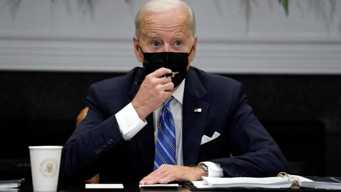President Joe Biden, here at a Dec. 16 meeting to discuss COVID-19, has been asked by Democratic lawmakers to end the Remain in México program.