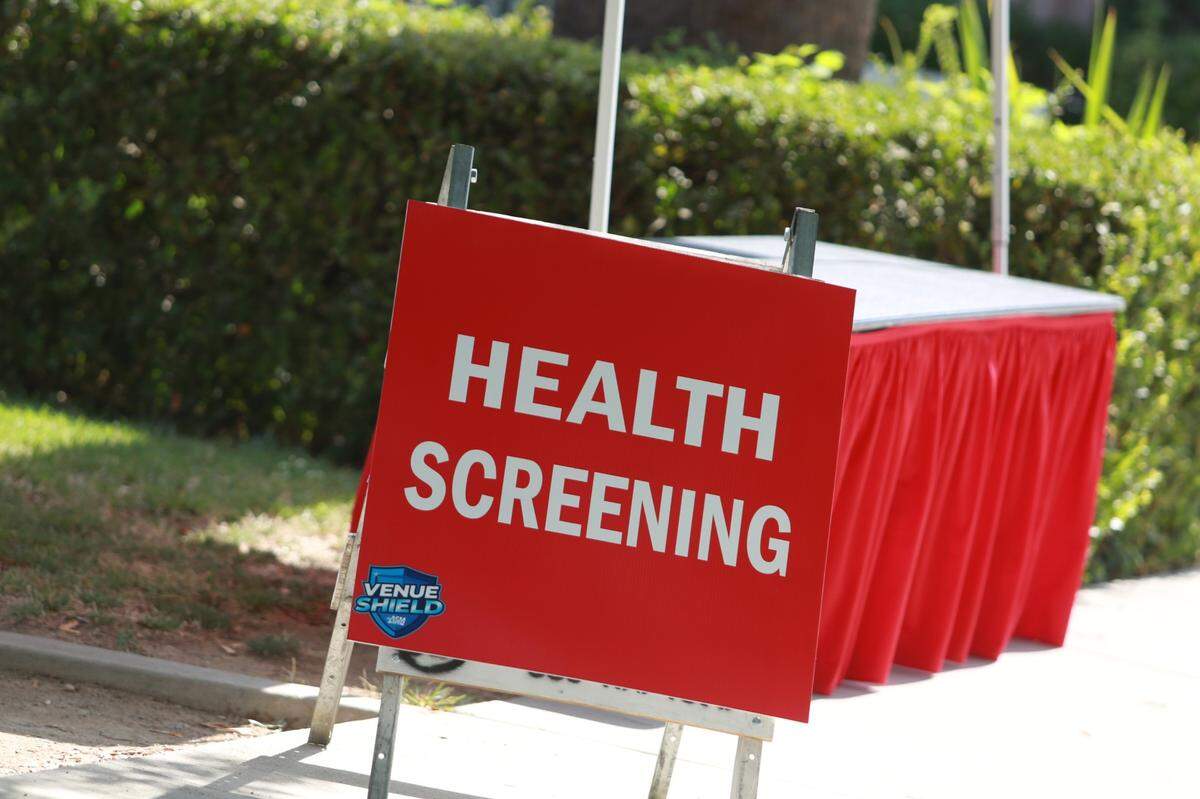 The Save Mart Center will have red tents set up all around the entrances that they will be utilizing for that evening events. People need to find a red tent, go get their documents checked, staff will give them a wristband to let you come in past the security checkpoints to enter a concert or event.