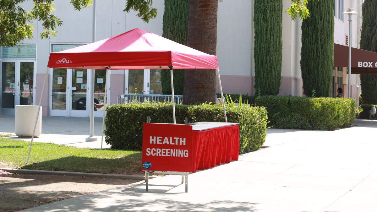 The Save Mart Center will have red tents set up all around the entrances that they will be utilizing for that evening events. People need to find a red tent, go get their documents checked, staff will give them a wristband to let you come in past the security checkpoints to enter a concert or event.