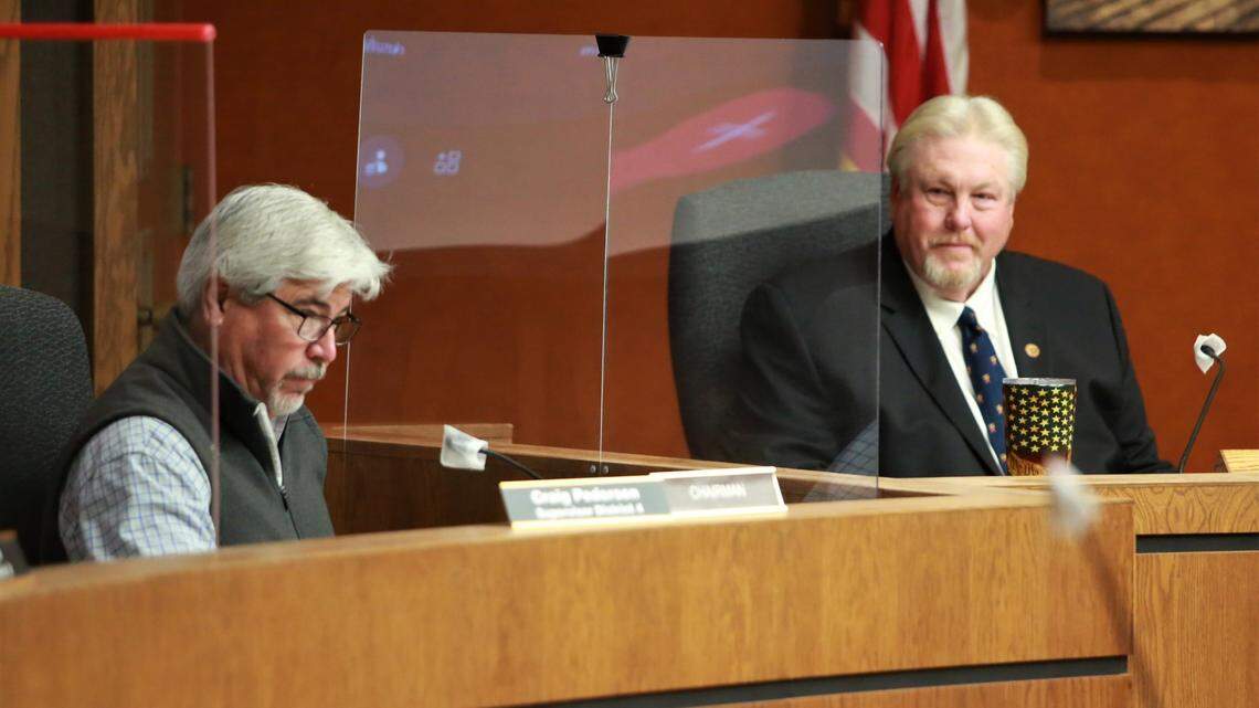 Kings County Board of Supervisors Chairman Craig Pedersen, left and Supervisor Doug Verboon voted on Dec. 14 in favor for the formal adoption of a supervisorial map that was submitted anonymously during the county’s redistricting process.