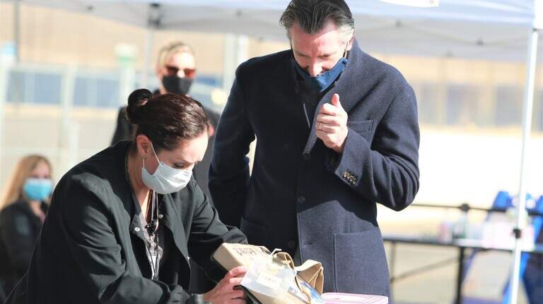 Newsom promotes COVID-19 vaccinations and booster shots during Kings County visit