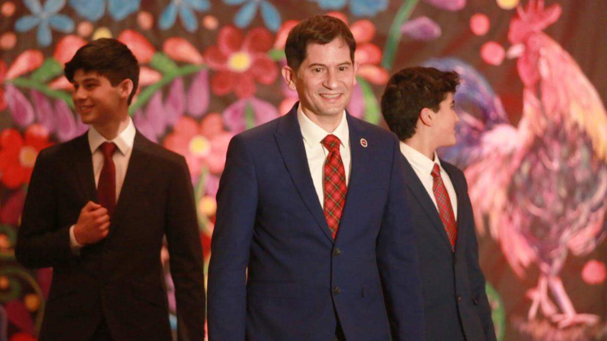 Attendees of the the 46th annual Fiesta Navideña were able to enjoy a fashion show that included a few special guest models like Fresno State President Saúl Jiménez-Sandoval with his sons Arion and Leo.